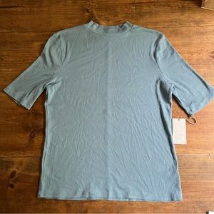 Woman’s High Neck Ribbed T-Shirt